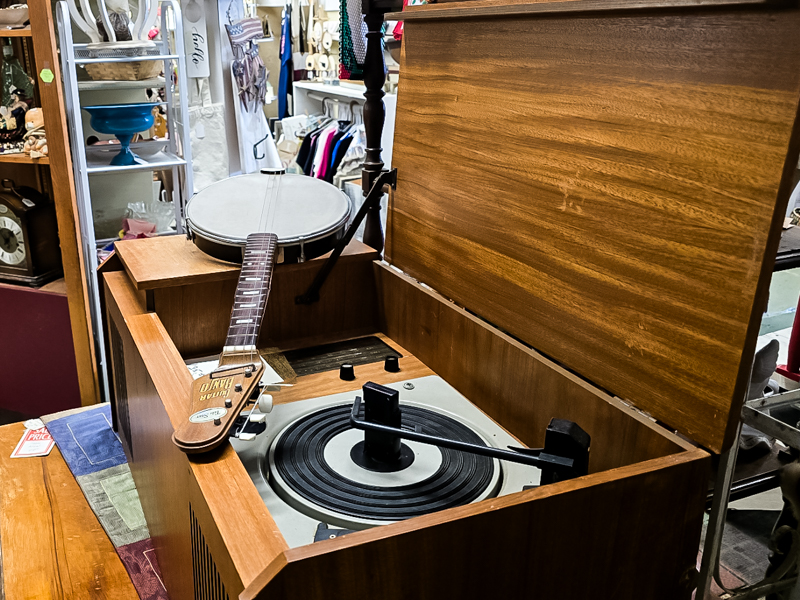 an antique record player console