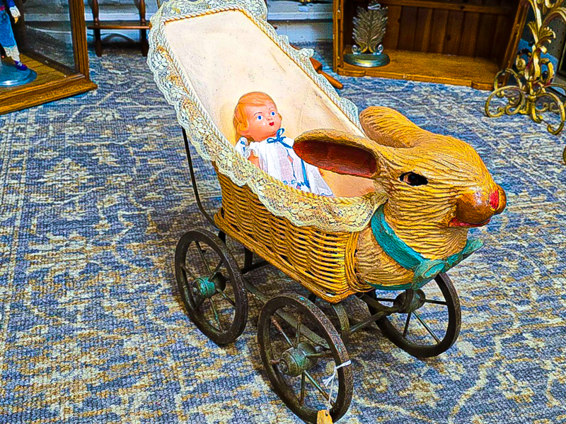 an antique baby carriage