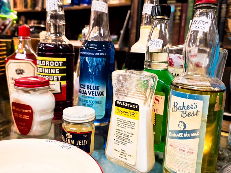 several vintage medicine and tonic bottles